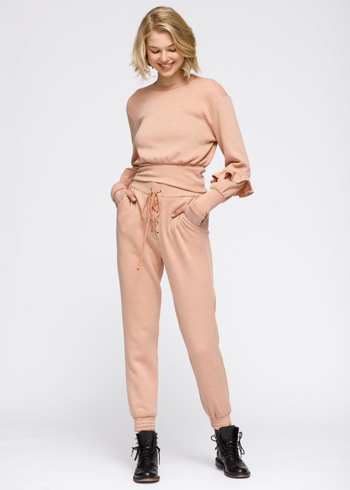 Crewneck Ruffle Sleeve Peplum Sweatshirt In Peach by Shop at Konus