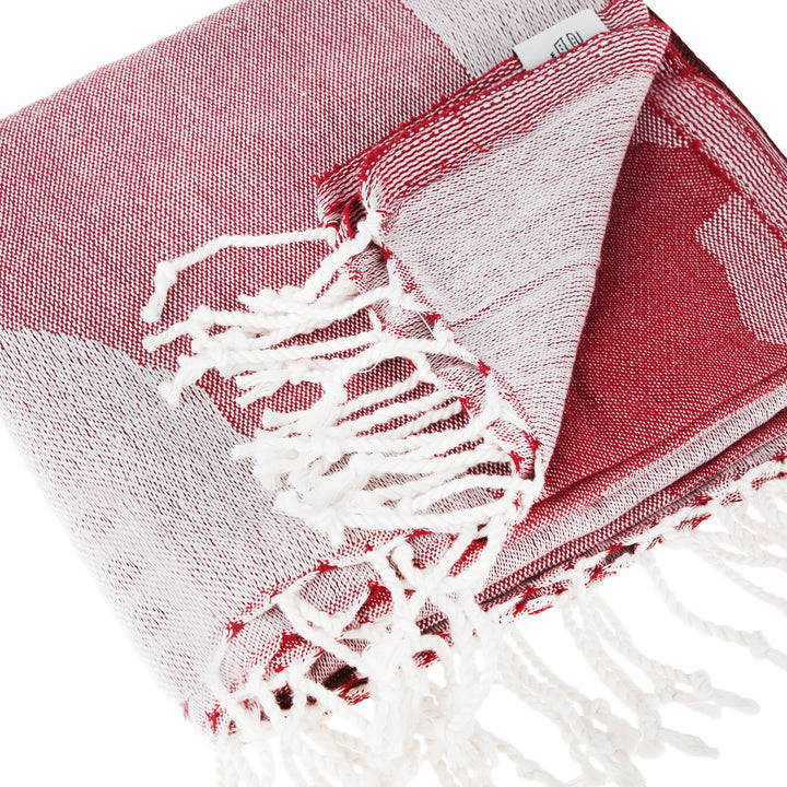 Arizona Sky Beach Towel in Bordeaux by La'Hammam